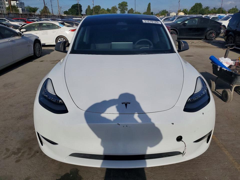 2023 Tesla Model y VIN 7SAYGDEE0PA052489 COPART salvage auction — REAR END, Ca - Salvage Certificate, sold $14,300 on 2026-07-29 (photo 5)