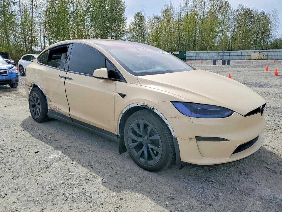 2023 Tesla Model x VIN 7SAXCBE51PF403490 COPART salvage auction — SIDE, Salvage Title, sold $15,300 on 2026-07-27 (photo 4)