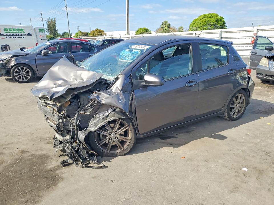 2014 Toyota Yaris VIN JTDKTUD34ED581420 COPART salvage auction — FRONT END, Fl - Cert Of Title Slvg Rebuildable, sold $700 on 2026-07-27 (photo 1)