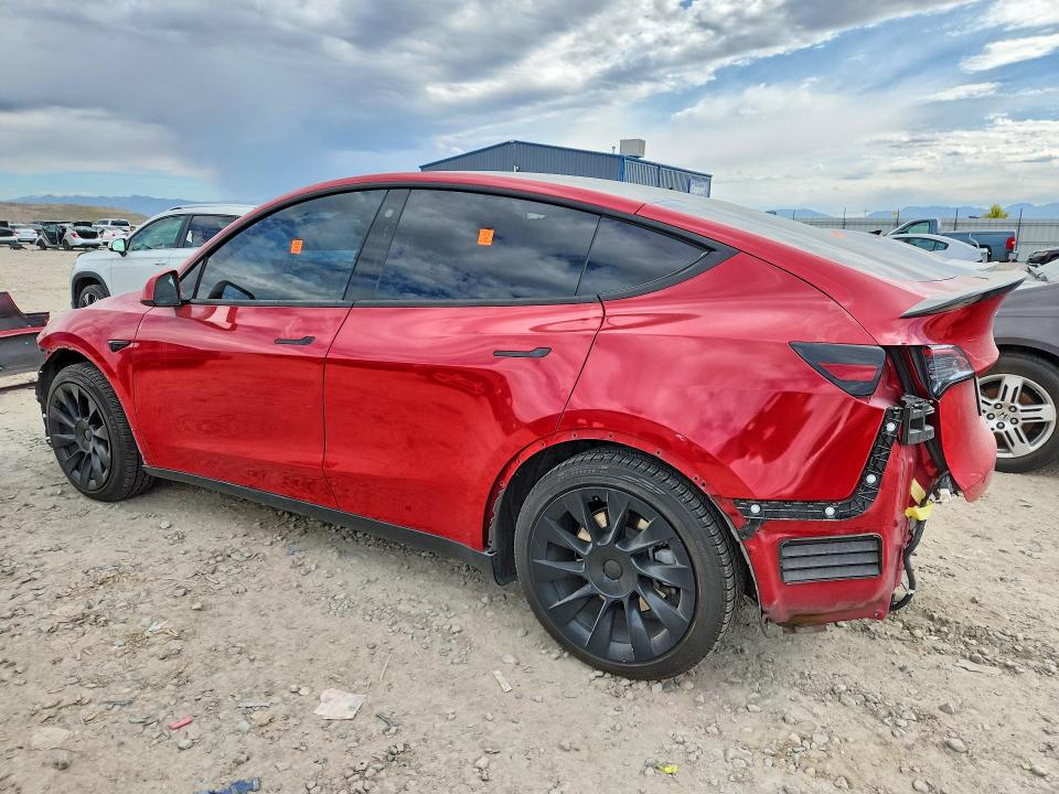 2023 Tesla Model y VIN 7SAYGAEEXPF587475 COPART salvage auction — SIDE, Ut - Salvage Certificate, sold $10,400 on 2026-07-31 (photo 2)