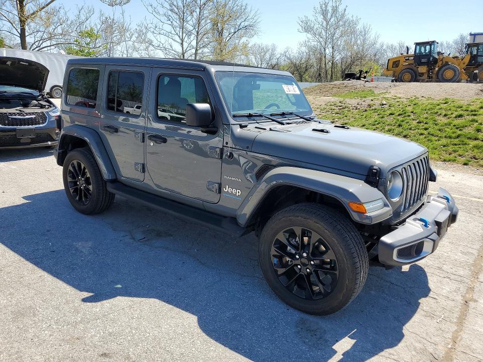2023 Jeep Wrangler / VIN 1C4JJXP69PW604562 COPART salvage auction — MINOR DENT/SCRATCHES, MO - CERTIFICATE OF TITLE, sold $18,900 on 2026-07-09 (photo 4)