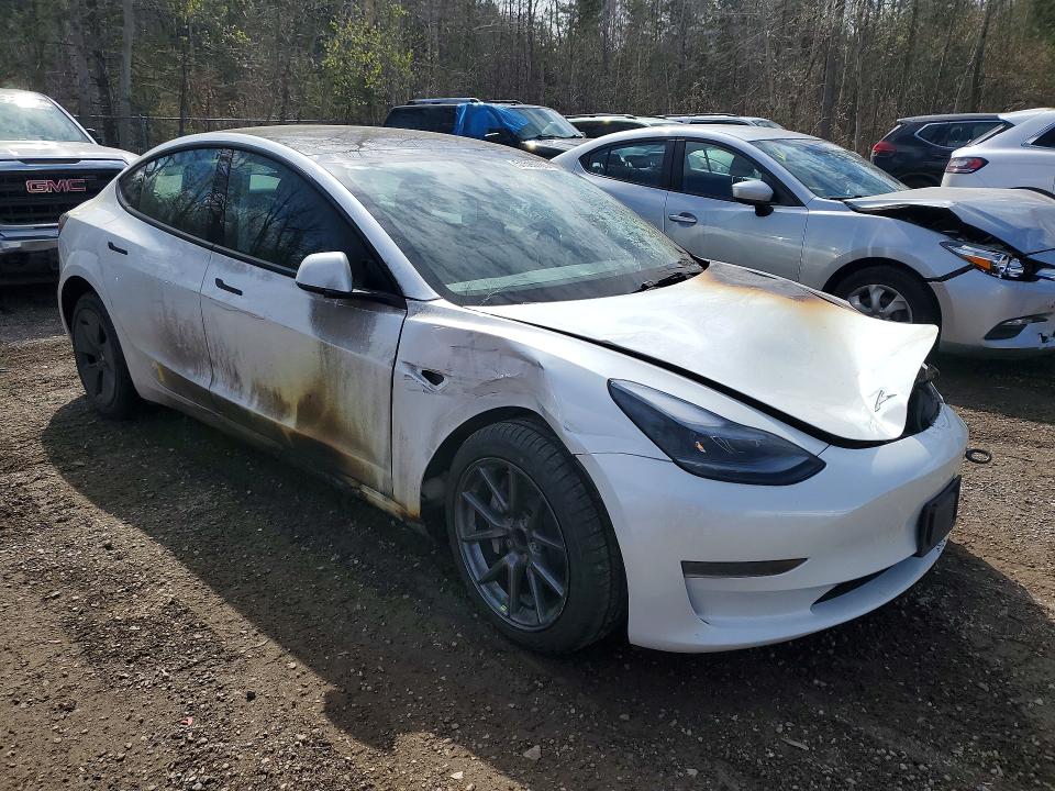 2023 Tesla Model 3 VIN 5YJ3E1EA5PF496852 COPART salvage auction — BURN, ON - PERMIT SALVAGE, sold $950 on 2026-08-25 (photo 4)