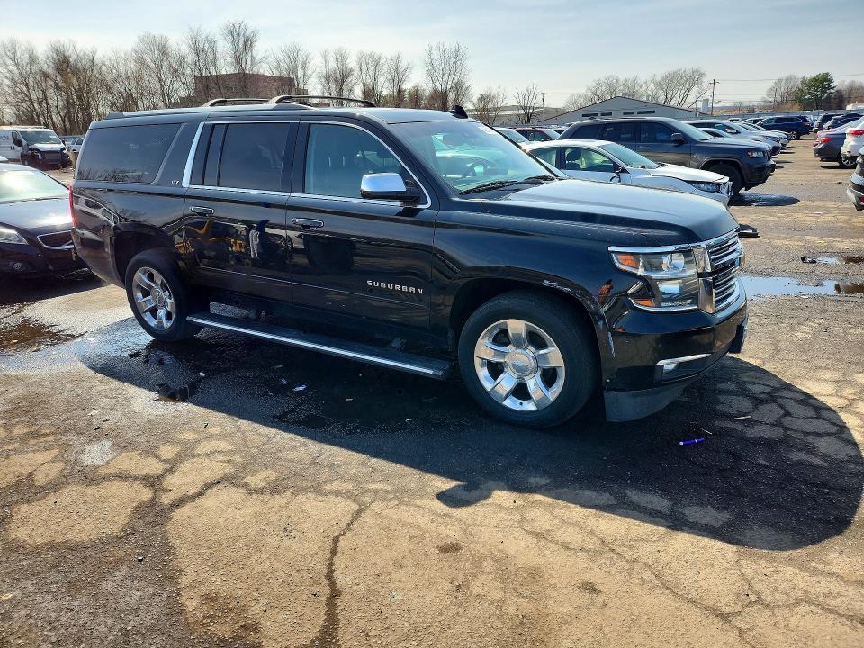 2015 Chevrolet Suburban VIN 1GNSKKKCXFR549870 COPART salvage auction — MINOR DENT/SCRATCHES, Nj - Certificate Of Title (P), sold $5,600 on 2026-07-03 (photo 4)