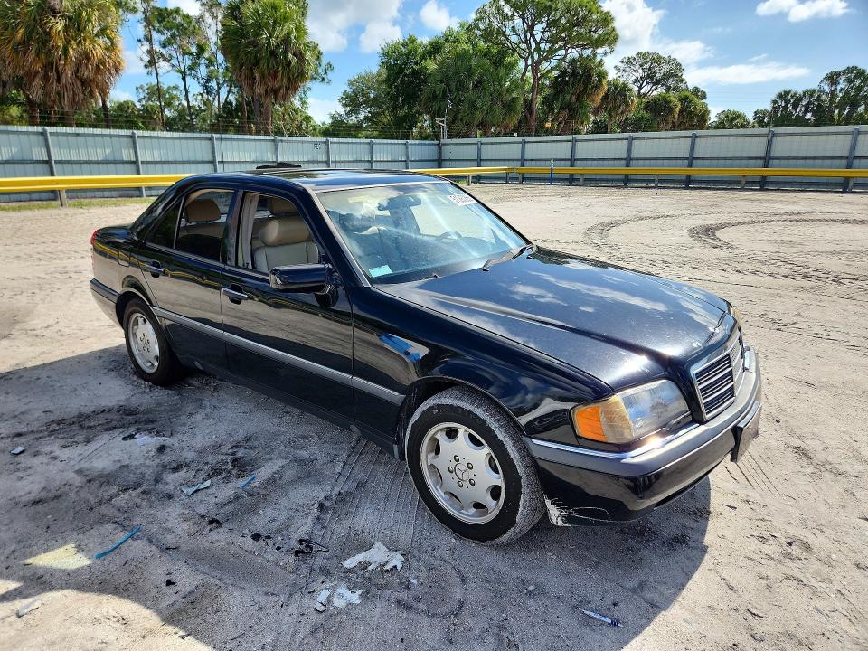 1995 Mercedes-benz C-klasse VIN WDBHA22E1SF229693 COPART salvage auction — SIDE, Fl - Cert Of Title Slvg Rebuildable, sold $250 on 2026-07-22 (photo 4)