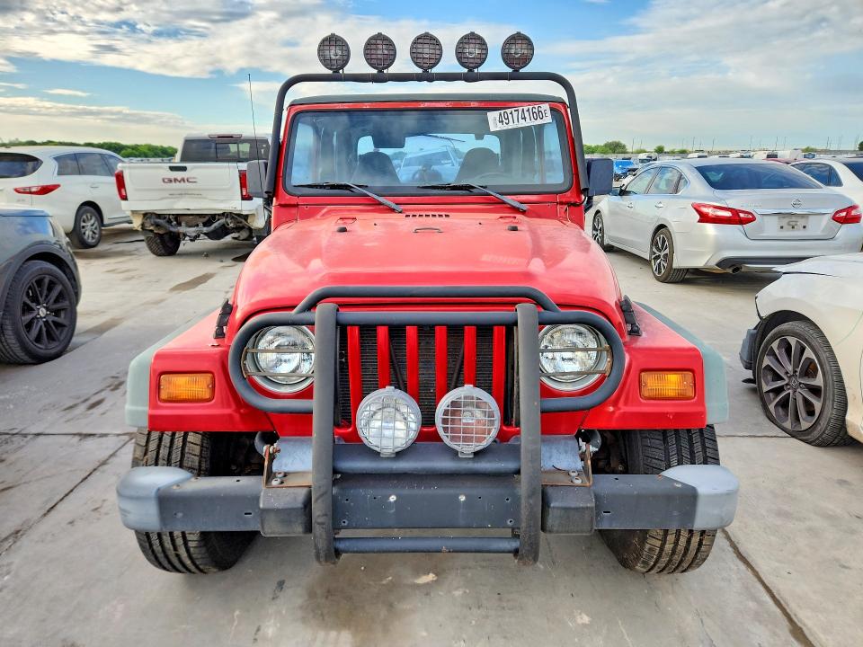 1998 Jeep Wrangler / VIN 1J4FY29P6WP783107 COPART salvage auction — NORMAL WEAR, TX - CERTIFICATE OF TITLE, sold $2,600 on 2026-07-09 (photo 5)