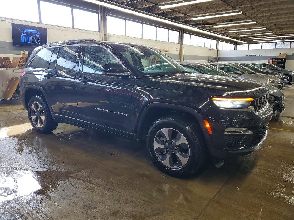 2022 Jeep Grand cherokee VIN 1C4RJYB61N8758538 COPART salvage auction — MINOR DENT/SCRATCHES, MO - CERTIFICATE OF TITLE, sold $14,300 on 2026-07-09 (photo 4)