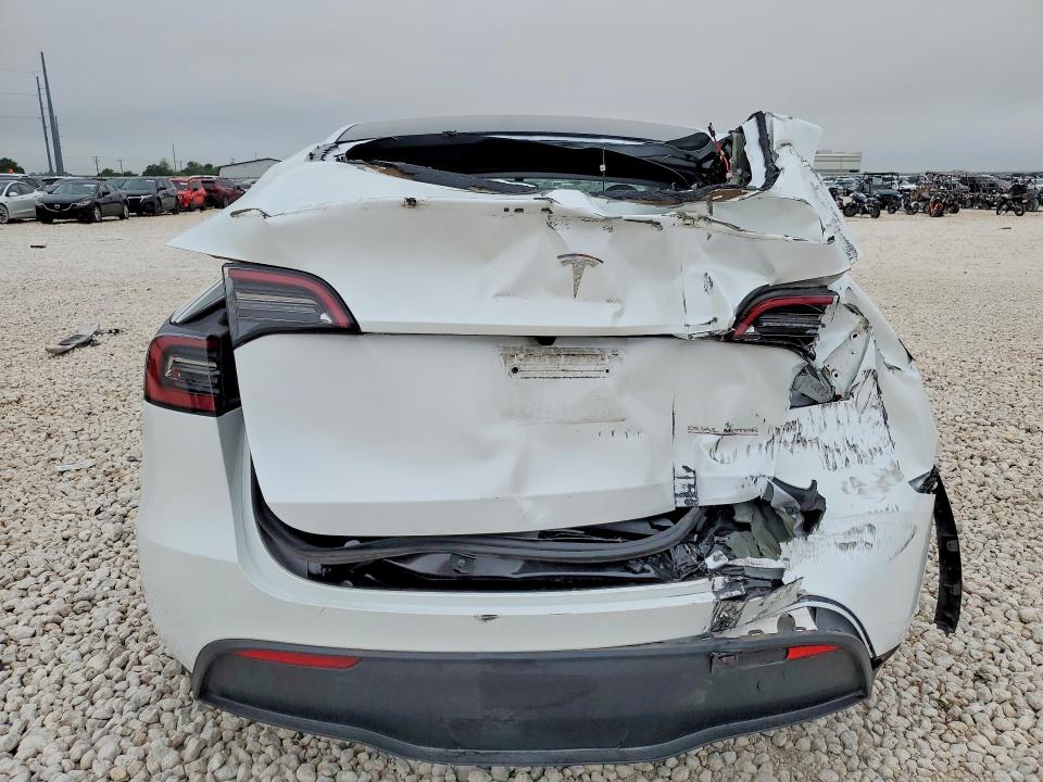 2024 Tesla Model y VIN 7SAYGDEF1RA275099 COPART salvage auction — REAR END, Tx - Salvage Vehicle Title, sold $12,400 on 2026-07-16 (photo 6)