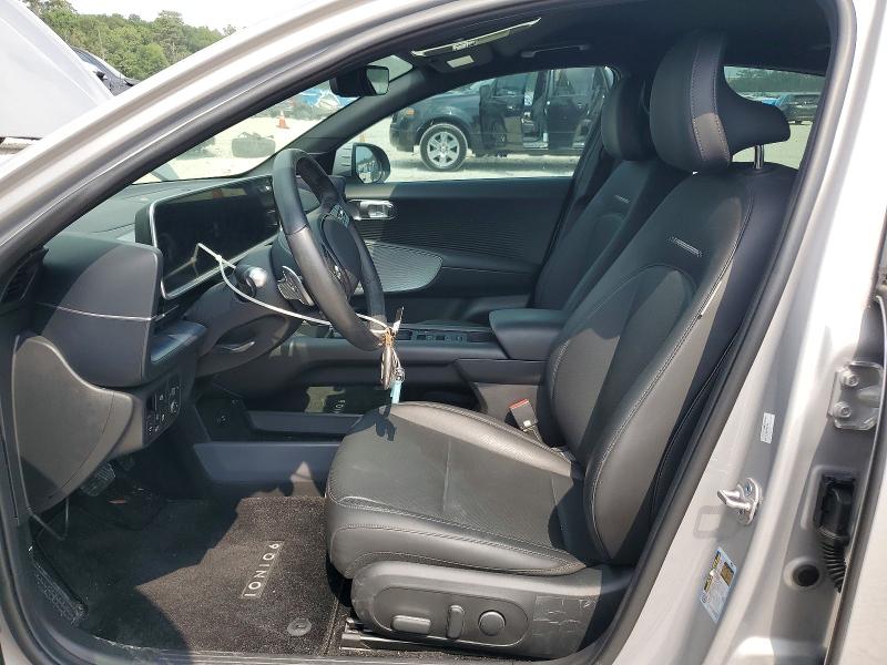 2024 Hyundai Ioniq 6 VIN KMHM34AC5RA066653 COPART salvage auction — SIDE, Tx - Certificate Of Title, sold $14,500 on 2026-07-07 (photo 7)