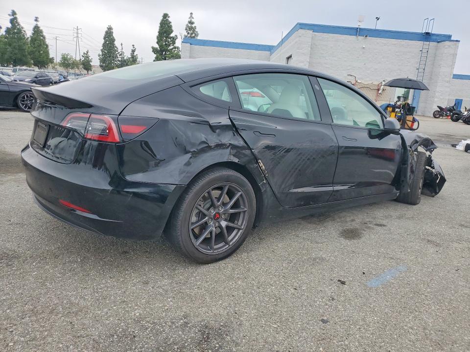 2023 Tesla Model 3 VIN 5YJ3E1EA3PF587702 COPART salvage auction — ALL OVER, Ca - Salvage Certificate, sold $5,000 on 2026-07-30 (photo 3)