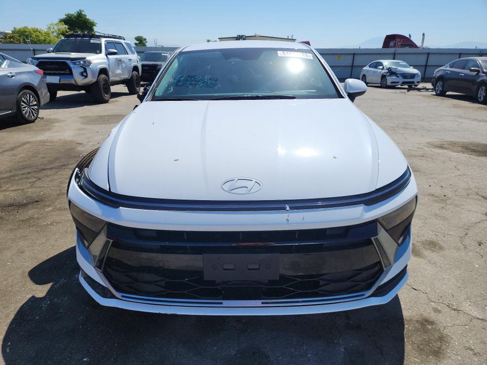 2026 Hyundai Sonata VIN KMHL24JJ2TA151955 COPART salvage auction — SIDE, Salvage Title, sold $7,200 on 2026-07-10 (photo 5)