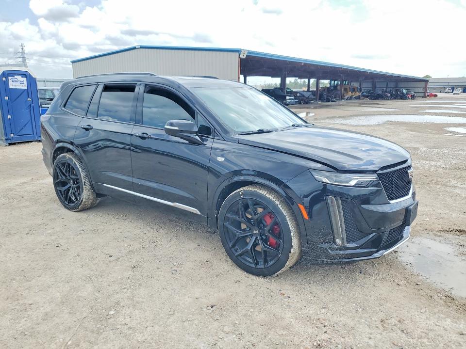 2023 Cadillac Xt6 VIN 1GYKPGRS5PZ135086 COPART salvage auction — WATER/FLOOD, Tx - Salvage Title-Flood Damage, sold $15,400 on 2026-07-14 (photo 4)