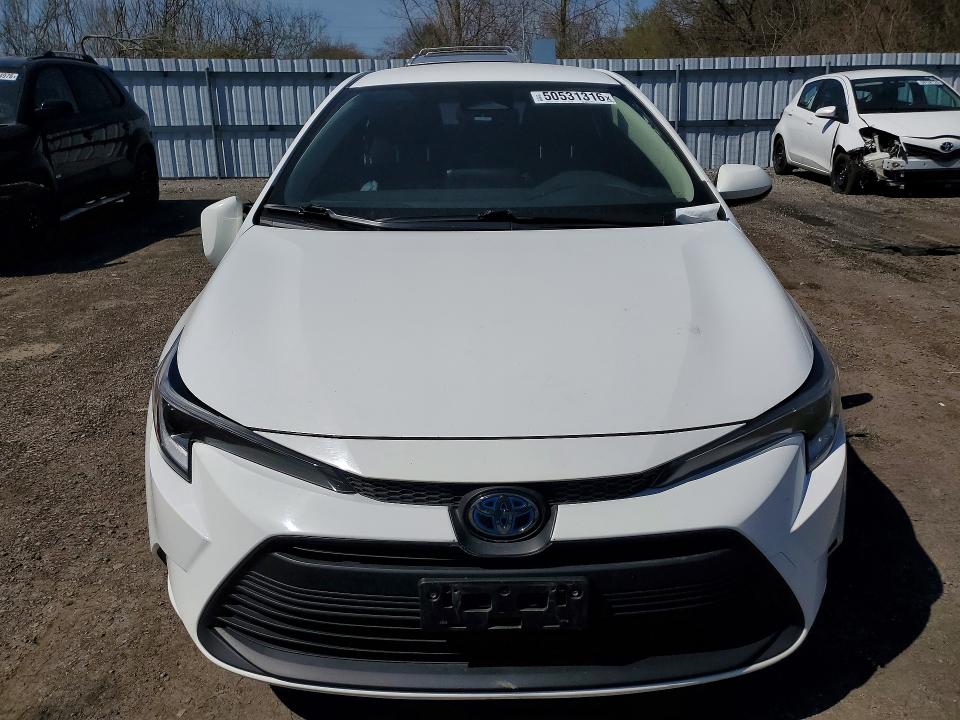 2023 Toyota Corolla VIN JTDBDMHE2P3003981 COPART salvage auction — SIDE, Salvage Title, sold $8,300 on 2026-07-21 (photo 5)