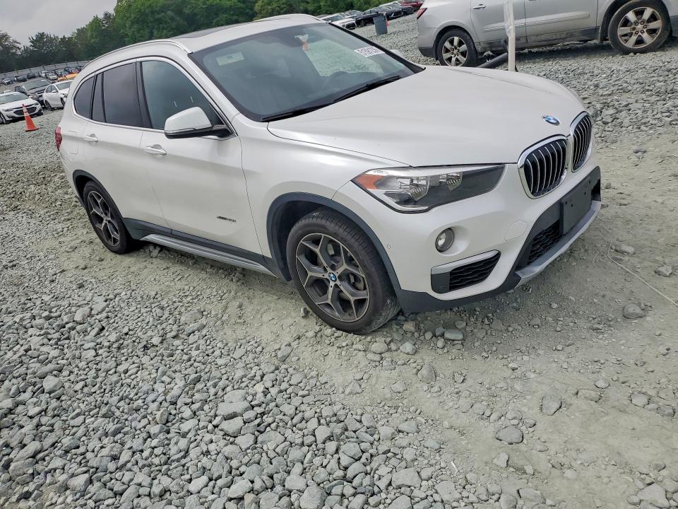 2016 BMW X1 VIN WBXHT3C39G5E56356 COPART salvage auction — MINOR DENT/SCRATCHES, Nc - Salvage Certificate Of Title, sold $1,300 on 2026-07-29 (photo 4)