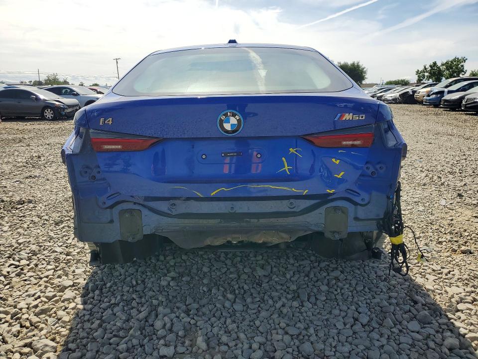 2024 BMW I4 VIN WBY33AW00RFT26519 COPART salvage auction — REAR END, Ca - Salvage Certificate, sold $27,000 on 2026-07-02 (photo 6)