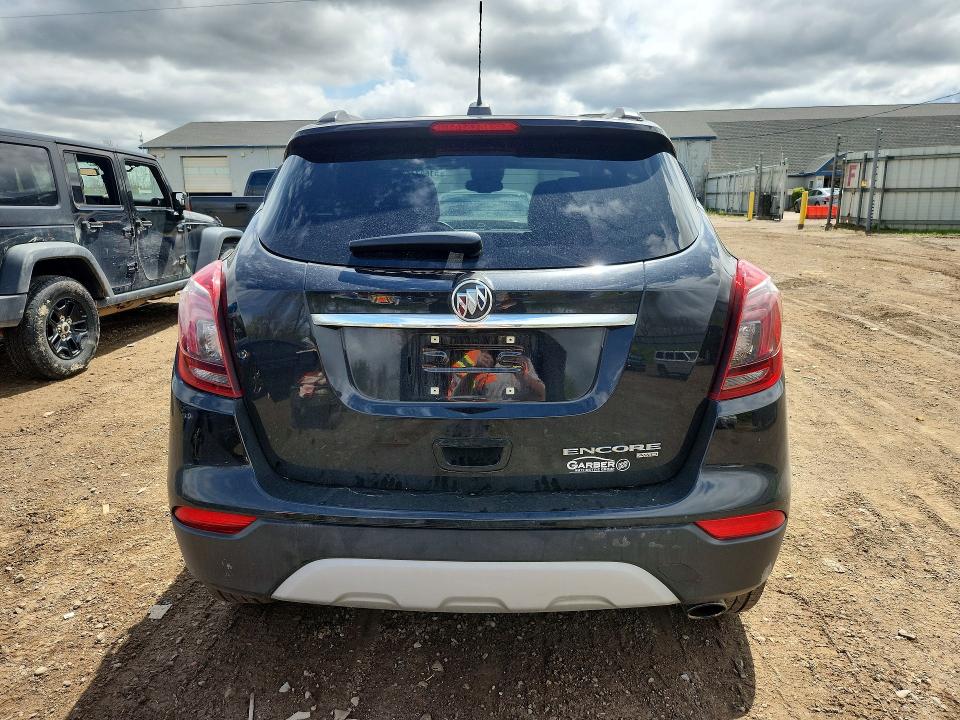 2021 Buick Encore VIN KL4CJESB1MB349016 COPART salvage auction — FRONT END, Mi - Certificate Of Title, sold $5,600 on 2026-07-08 (photo 6)
