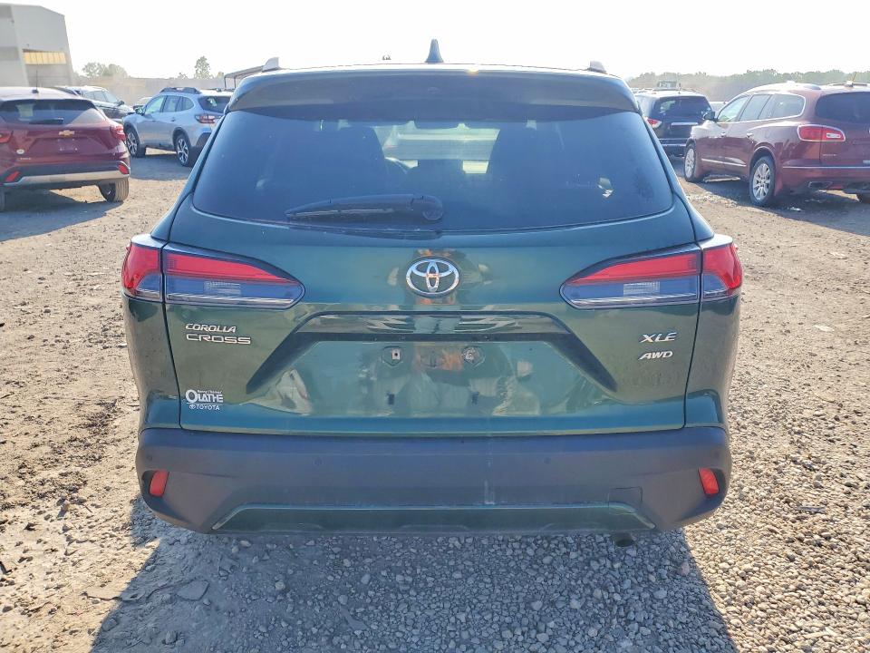 2022 Toyota Corolla cross VIN 7MUDAABG3NV002706 COPART salvage auction — SIDE, KS - CERT OF TITLE-SALVAGE, sold $7,000 on 2026-07-14 (photo 6)