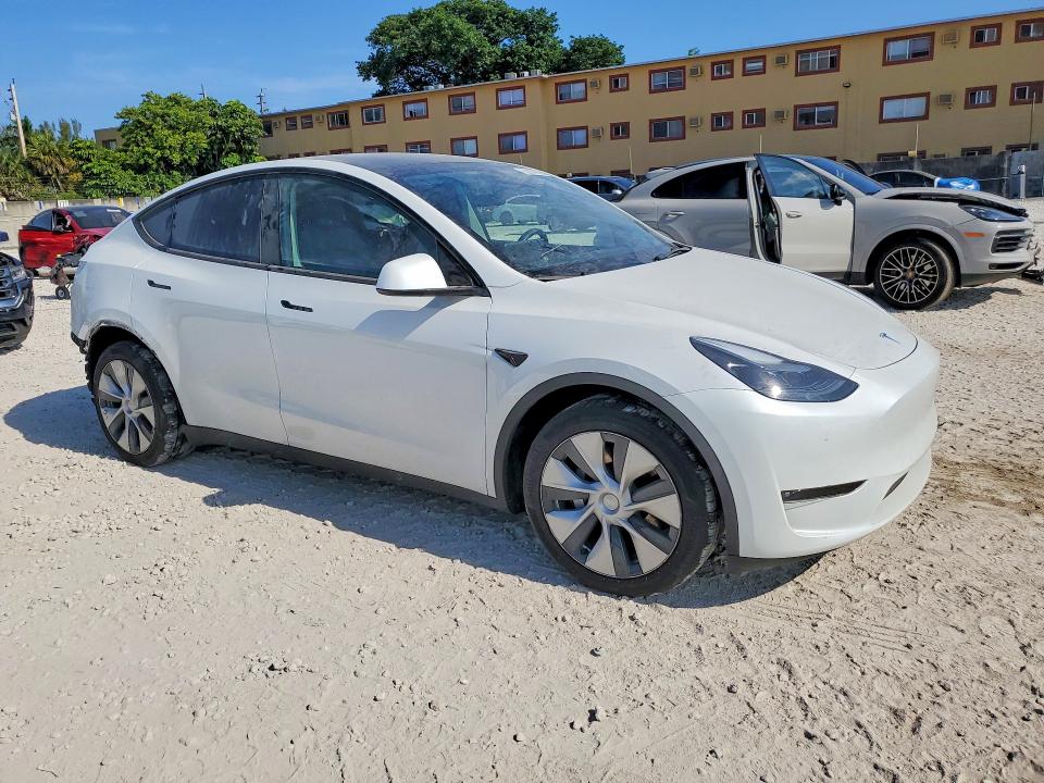 2023 Tesla Model y VIN 7SAYGDEE7PF880185 COPART salvage auction — REAR END, FL - CERT OF TITLE SLVG REBUILDABLE, sold $9,100 on 2026-07-28 (photo 4)