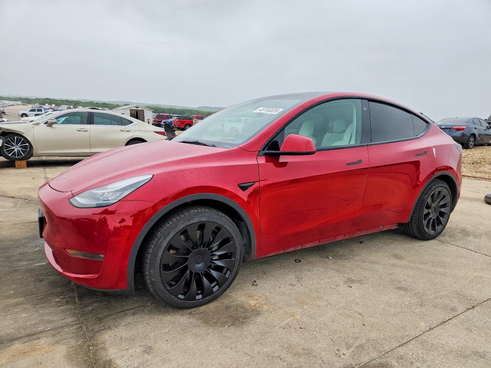 2021 Tesla Model y VIN 5YJYGDEE6MF230773 COPART salvage auction — SIDE, Tx - Salvage Vehicle Title, sold $14,100 on 2026-07-20 (photo 1)