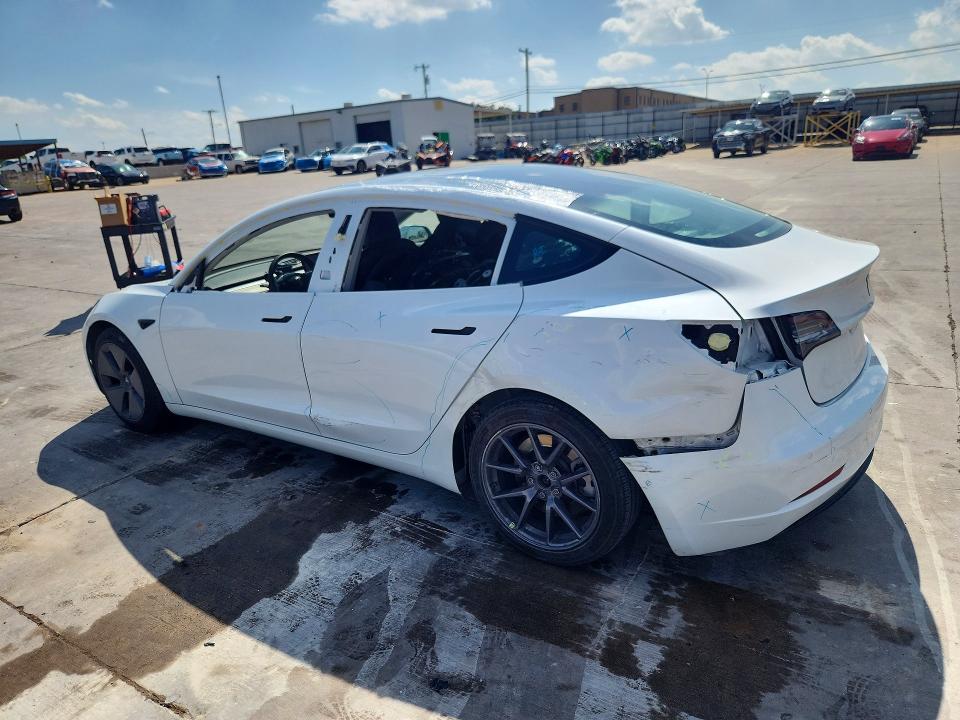 2021 Tesla Model 3 VIN 5YJ3E1EA5MF053693 COPART salvage auction — SIDE, Tx - Salvage Vehicle Title, sold $6,500 on 2026-07-09 (photo 2)