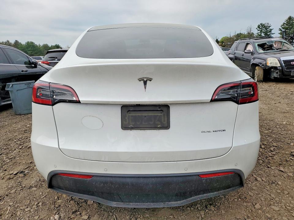 2021 Tesla Model y VIN 5YJYGAEE3MF191025 COPART salvage auction — SIDE, Md - Cert Of Salvage < 75% Damage, sold $250 on 2026-07-27 (photo 6)