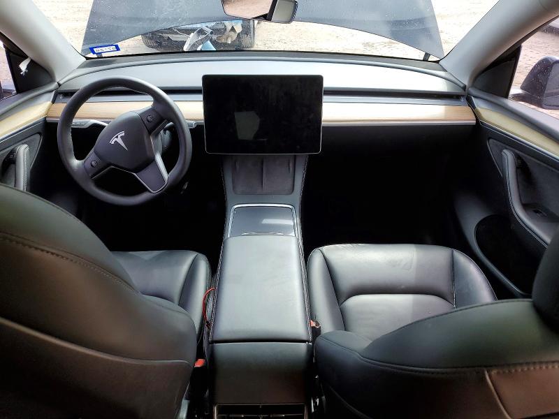 2023 Tesla Model y VIN 7SAYGDEE5PA054822 COPART salvage auction — SIDE, Tx - Salvage Vehicle Title, sold $11,800 on 2026-07-03 (photo 8)