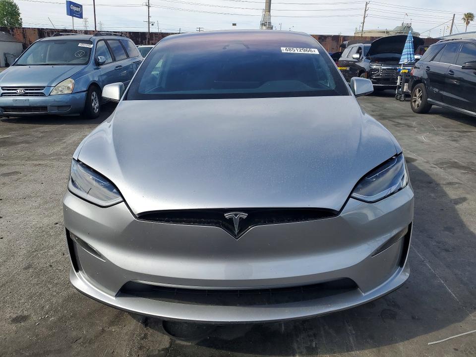 2024 Tesla VIN 7SAXCDE55RF458345 COPART salvage auction — SIDE, Ca - Salvage Certificate, sold $32,250 on 2026-07-15 (photo 5)