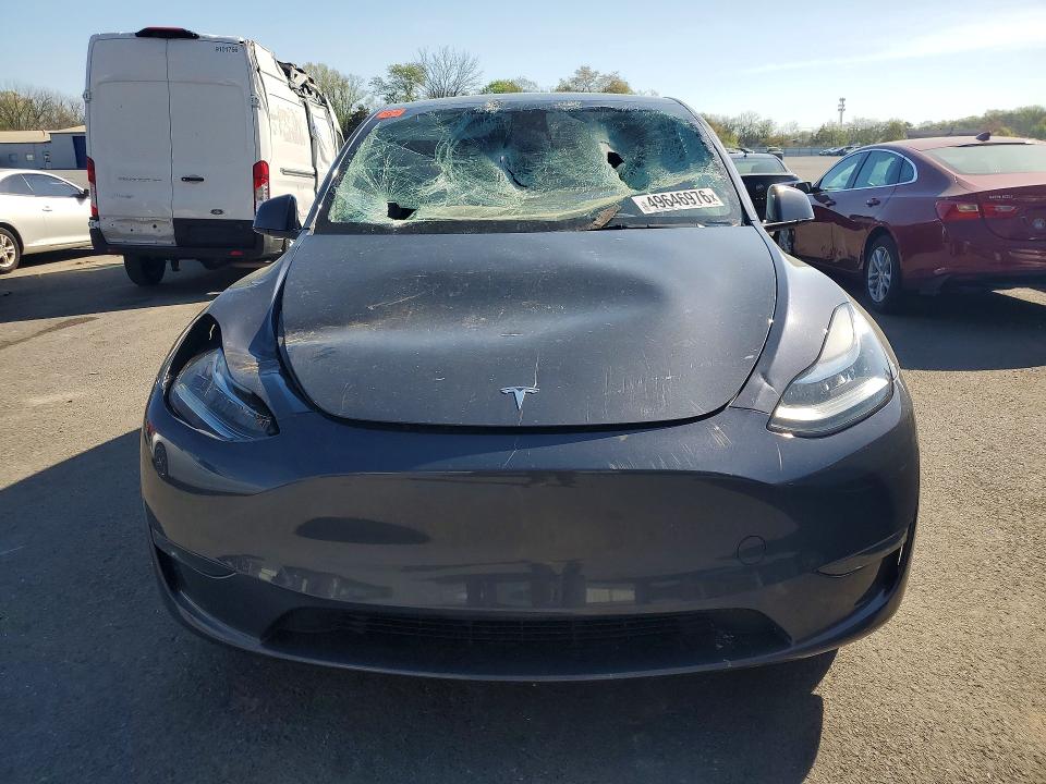 2023 Tesla Model y VIN 7SAYGDEE3PA036061 COPART salvage auction — FRONT END, NJ - CERT OF TITLE-SALVAGE, sold $13,100 on 2026-07-28 (photo 5)