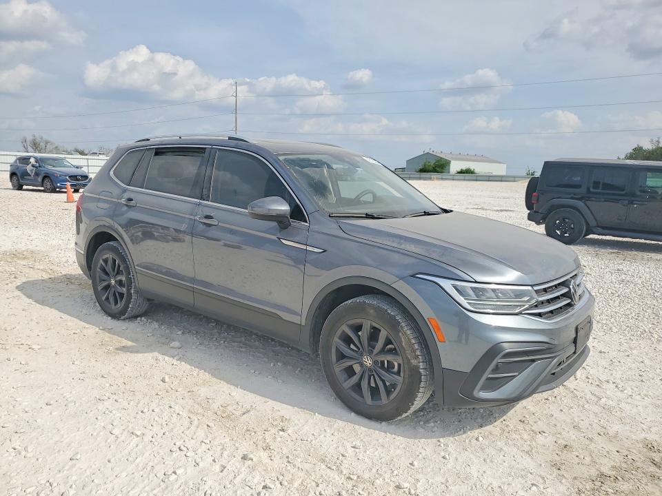 2024 Volkswagen Tiguan VIN 3VVNB7AX0RM106884 COPART salvage auction — SIDE, Tx - Salvage Vehicle Title, sold $9,100 on 2026-07-09 (photo 4)