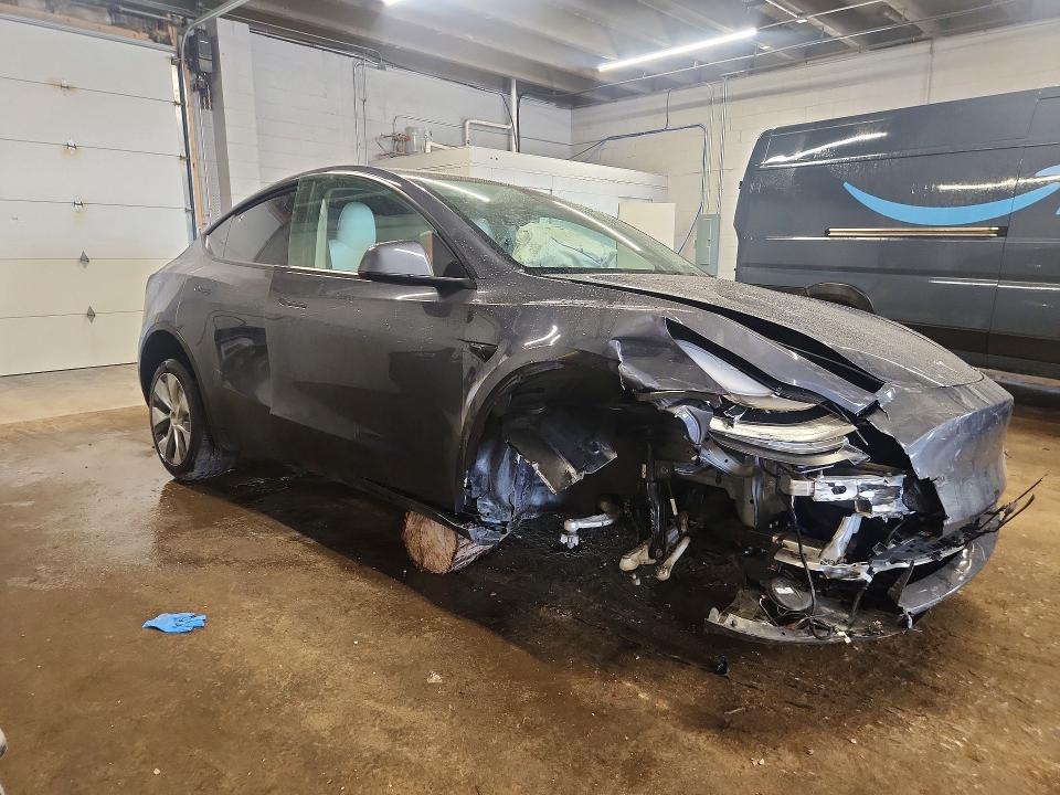 2023 Tesla Model y VIN 7SAYGDEE2PF610247 COPART salvage auction — FRONT END, Il - Salvage Certificate, sold $7,300 on 2026-07-22 (photo 4)