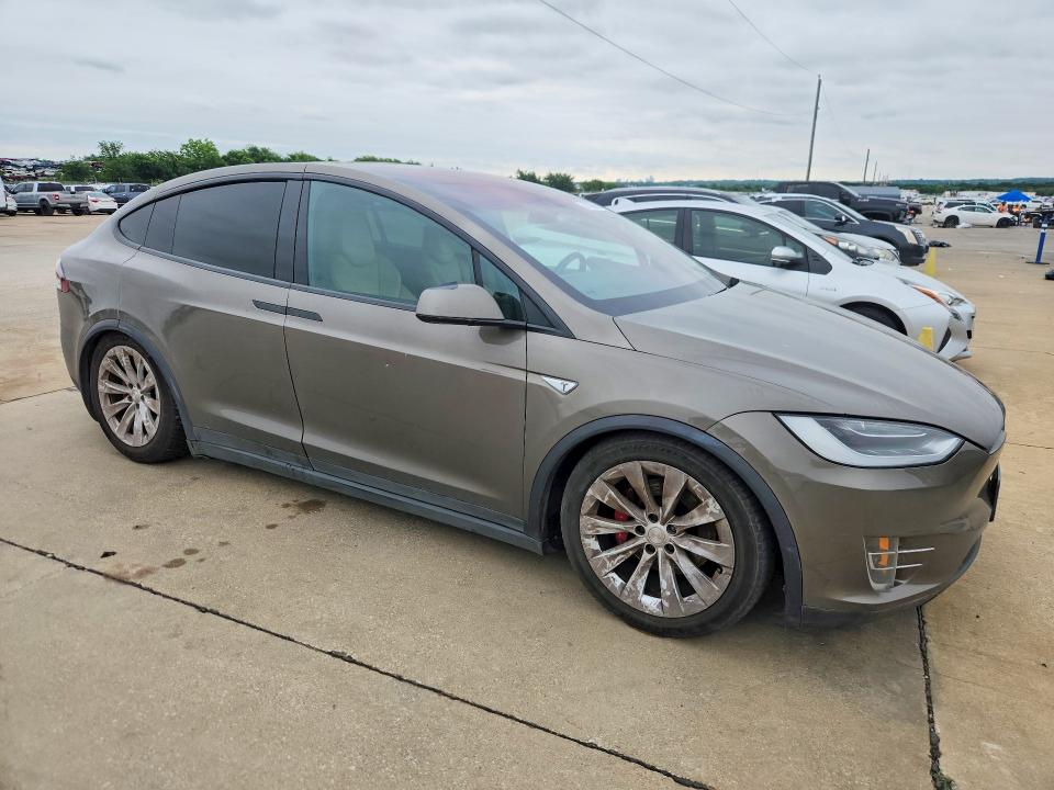 2016 Tesla Model x VIN 5YJXCAE47GFS00618 COPART salvage auction — NORMAL WEAR, Tx - Certificate Of Title, sold $8,800 on 2026-07-02 (photo 4)