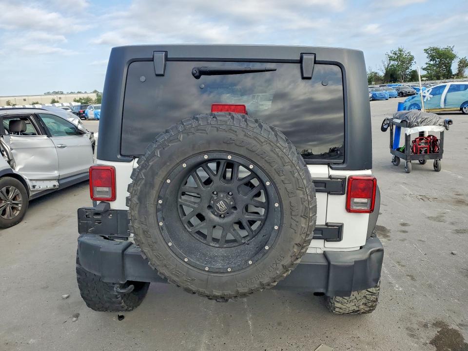2016 Jeep Wrangler / VIN 1C4BJWDG7GL169506 COPART salvage auction — FRONT END, Fl - Cert Of Title Slvg Rebuildable, sold $3,200 on 2026-07-09 (photo 6)