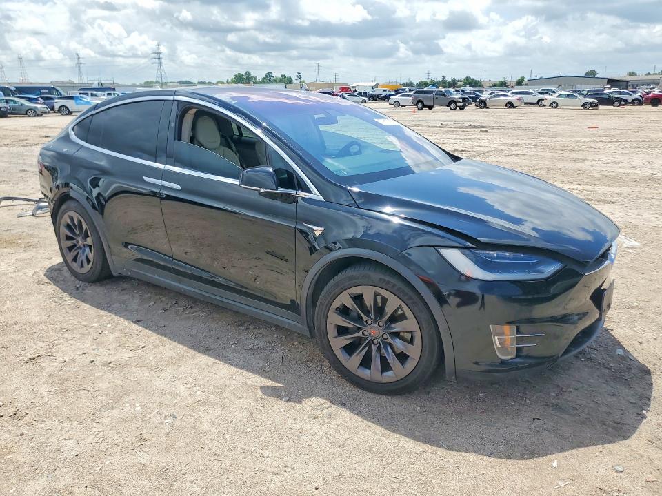 2018 Tesla Model x VIN 5YJXCBE29JF136366 COPART salvage auction — REAR END, TX - SALVAGE VEHICLE TITLE, sold $8,200 on 2026-07-28 (photo 4)