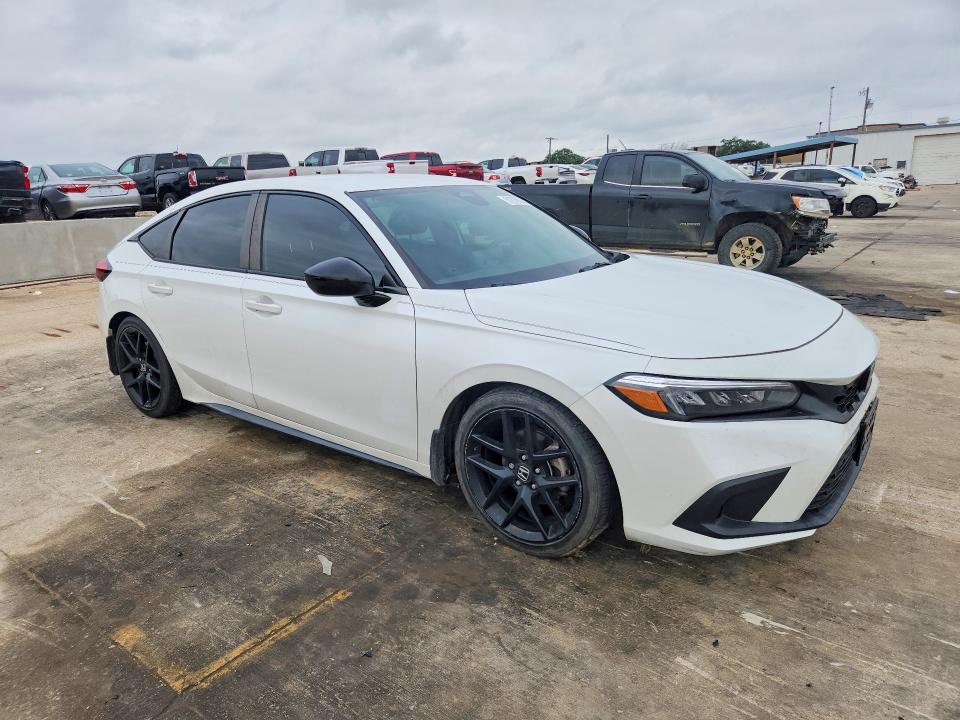 2023 Honda Civic VIN 19XFL2H89PE022992 COPART salvage auction — WATER/FLOOD, Tx - Salvage Title-Flood Damage, sold $8,400 on 2026-07-09 (photo 4)