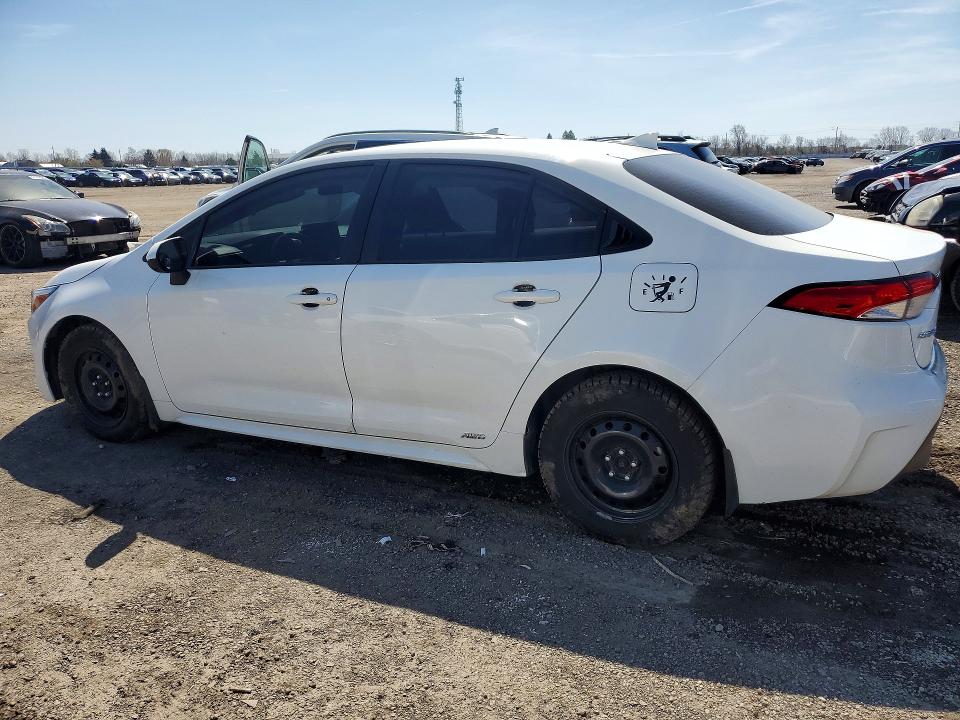 2023 Toyota Corolla VIN JTDBDMHE2P3003981 COPART salvage auction — SIDE, Salvage Title, sold $8,300 on 2026-07-21 (photo 2)