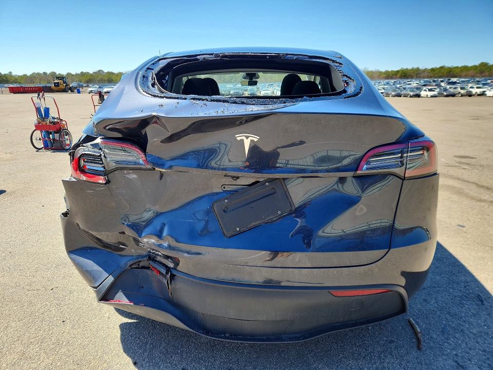 2024 Tesla Model y VIN 7SAYGDED6RF211836 COPART salvage auction — REAR END, Ny - Mv-907A Salvage Certificate, sold $12,300 on 2026-07-20 (photo 6)