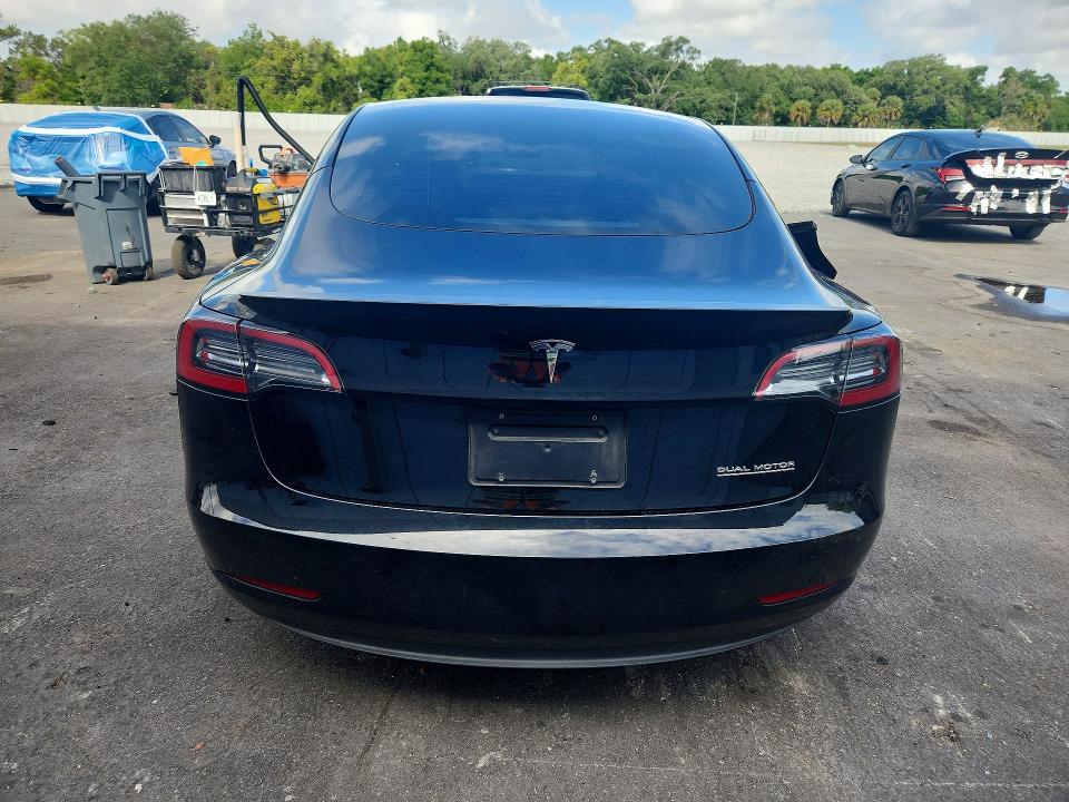 2023 Tesla Model 3 VIN 5YJ3E1EC2PF582671 COPART salvage auction — SIDE, FL, sold $7,900 on 2026-07-27 (photo 6)