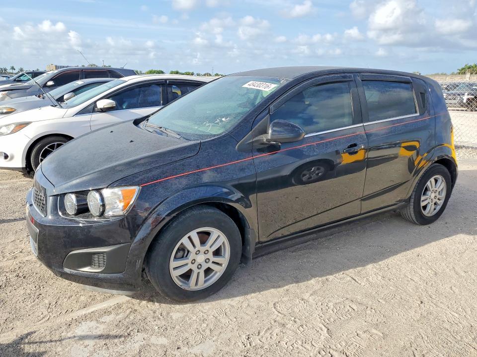 2015 Chevrolet SONIC VIN 1G1JC6SH5F4147569 COPART salvage auction — MINOR DENT/SCRATCHES, Fl - Cert Of Title-Slvg Rebld Flood, sold $950 on 2026-07-21 (photo 1)