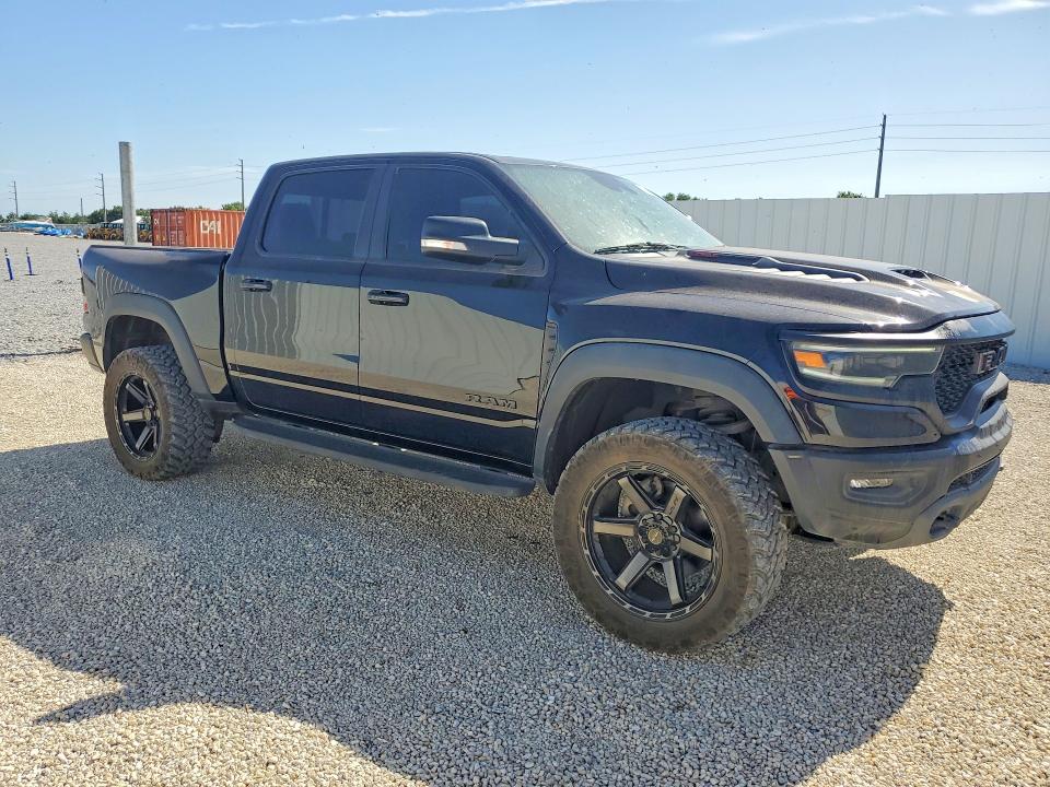 2021 Ram 1500 VIN 1C6SRFU90MN902187 COPART salvage auction — VANDALISM, Fl - Cert Of Title Slvg Rebuildable, sold $49,250 on 2026-07-21 (photo 4)