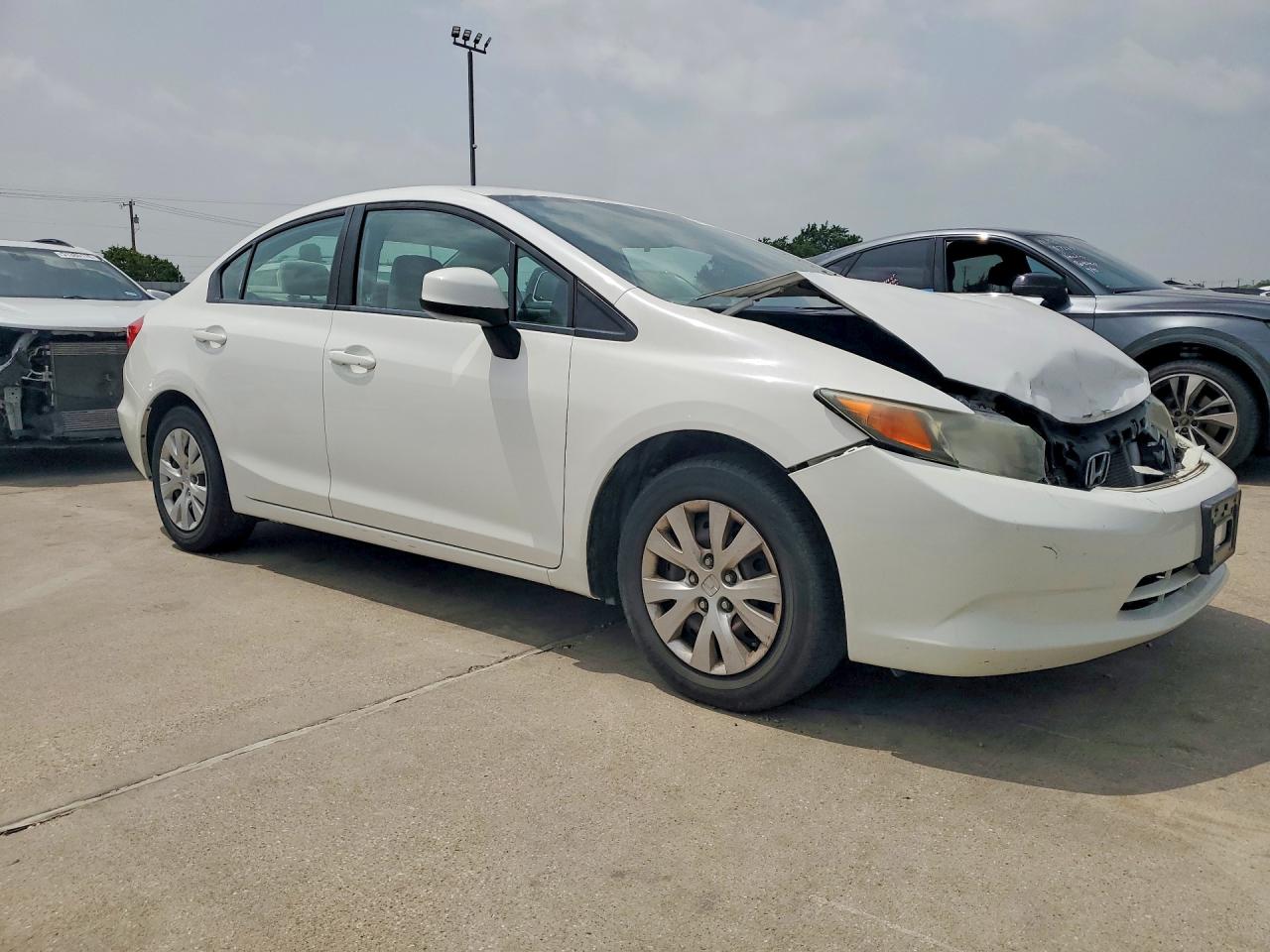 2012 Honda Civic VIN 19XFB2F53CE372107 COPART salvage auction — Front End, TX - SALVAGE VEHICLE TITLE, sold $1,650 on 2026-06-25 (photo 4)