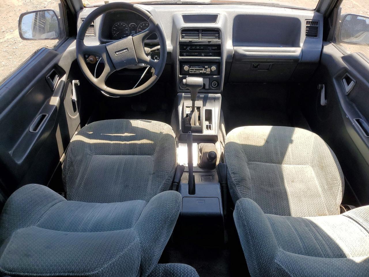 1989 Suzuki Sidekick VIN JS3TA01C5K4112583 COPART salvage auction — Minor Dent/Scratches, Dv - Clean Title, sold $1,350 on 2026-09-11 (photo 8)