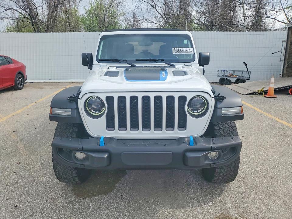 2023 Jeep Wrangler / VIN 1C4JJXR6XPW621464 COPART salvage auction — MINOR DENT/SCRATCHES, MO - CERTIFICATE OF TITLE, sold $18,300 on 2026-07-09 (photo 5)