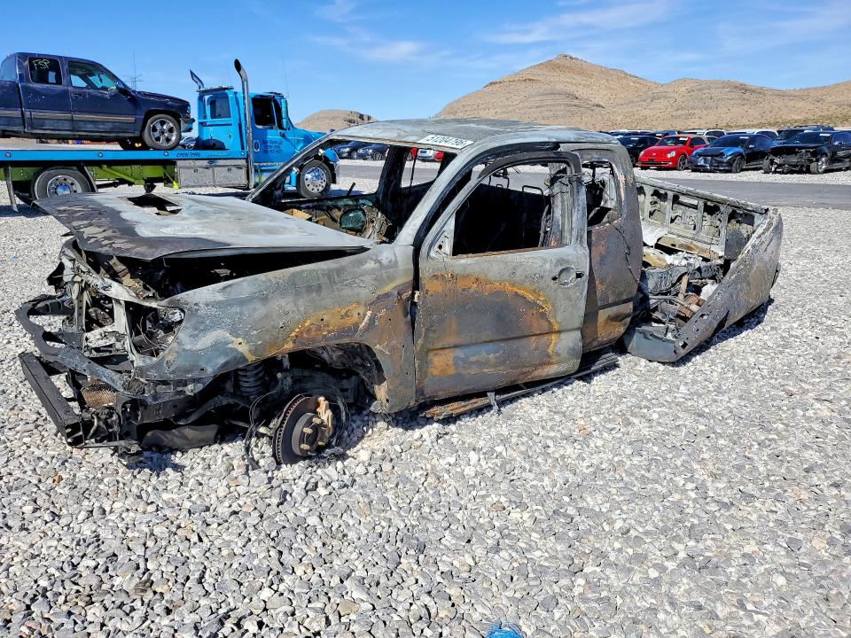 2014 Toyota Tacoma VIN 5TFTU4GN4EX063840 COPART salvage auction — BURN, NV - NON-REPAIRABLE VEHICLE CERT, sold $125 on 2026-07-27 (photo 1)