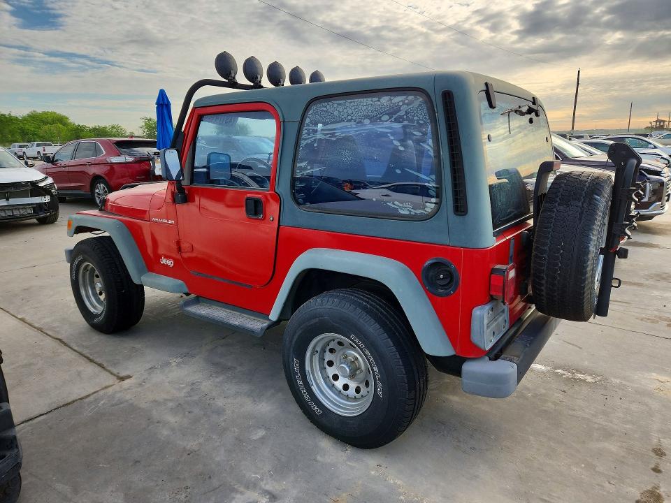 1998 Jeep Wrangler / VIN 1J4FY29P6WP783107 COPART salvage auction — NORMAL WEAR, TX - CERTIFICATE OF TITLE, sold $2,600 on 2026-07-09 (photo 2)