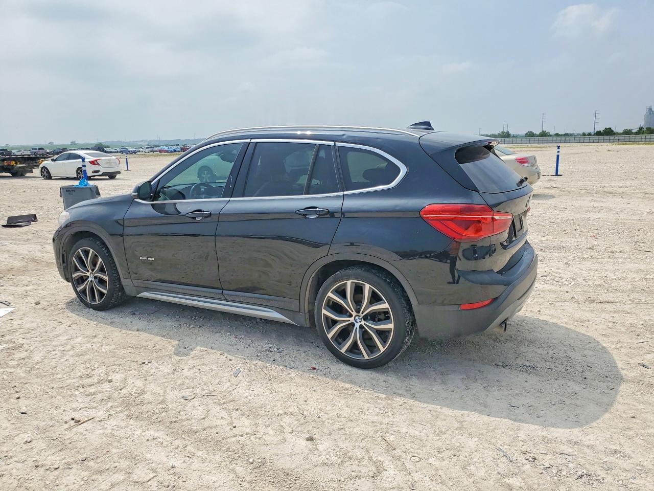 2017 BMW X1 VIN WBXHT3C35H5F75779 COPART salvage auction — Minor Dent/Scratches, TX - CERTIFICATE OF TITLE, sold $4,400 on 2026-07-09 (photo 2)