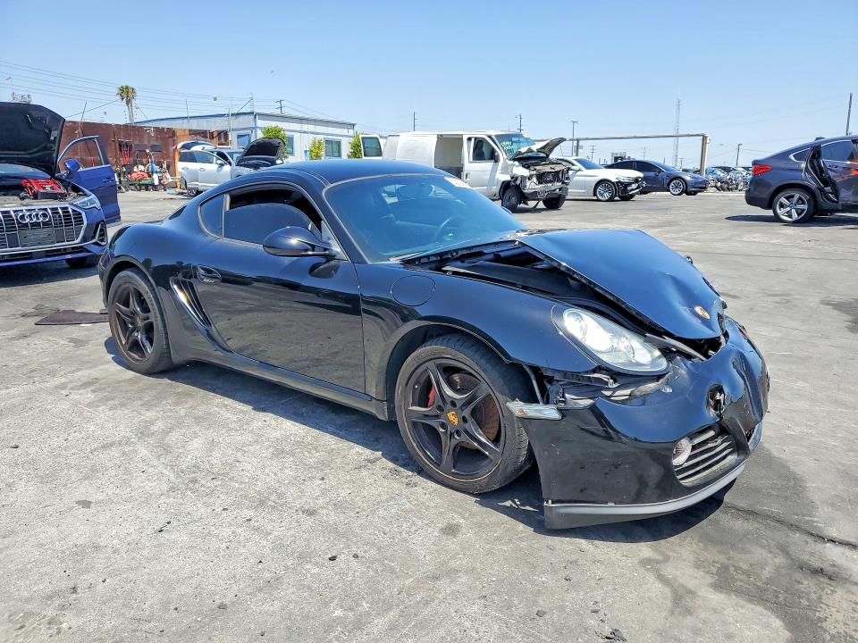 2009 Porsche Cayman VIN WP0AA29879U760468 COPART salvage auction — FRONT END, Fl - Dis/Dlr/Exp Only Clean Title (P), sold $5,700 on 2026-07-14 (photo 4)
