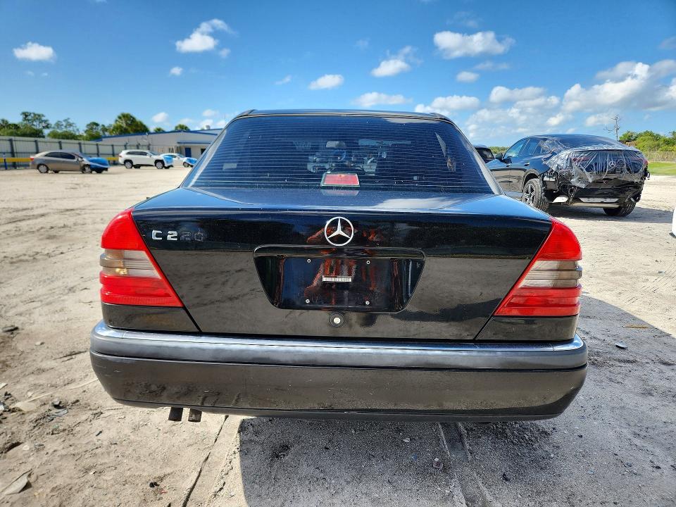 1995 Mercedes-benz C-klasse VIN WDBHA22E1SF229693 COPART salvage auction — SIDE, Fl - Cert Of Title Slvg Rebuildable, sold $250 on 2026-07-22 (photo 6)