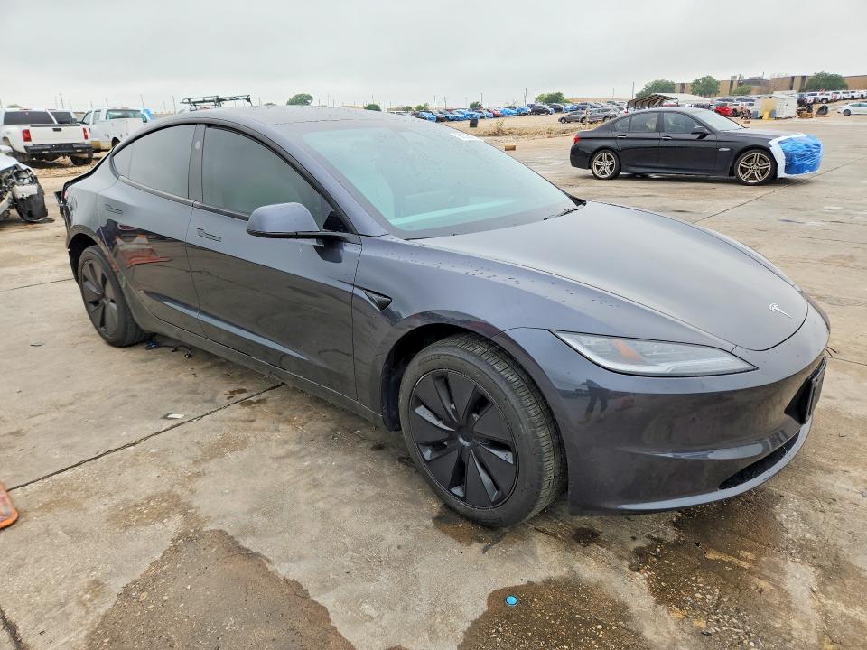 2025 Tesla Model 3 VIN 5YJ3E1EA0SF991632 COPART salvage auction — REAR END, Tx - Certificate Of Title, sold $16,100 on 2026-07-02 (photo 4)