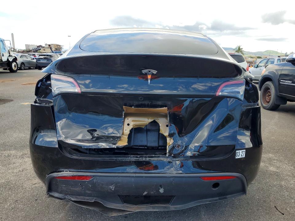 2025 Tesla Model y VIN 7SAYGDED9SF317378 COPART salvage auction — REAR END, Hi - Certificate Of Salvage, sold $2,150 on 2026-08-24 (photo 6)
