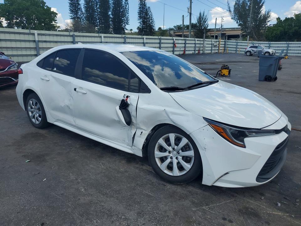 2023 Toyota Corolla VIN 5YFB4MDE6PP008145 COPART salvage auction — SIDE, Salvage Title, sold $5,400 on 2026-08-20 (photo 4)