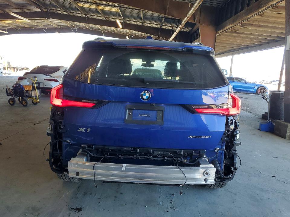 2023 BMW X1 VIN WBX73EF0XP5Y06910 COPART salvage auction — SIDE, Ca - Salvage Certificate, sold $14,000 on 2026-07-30 (photo 6)